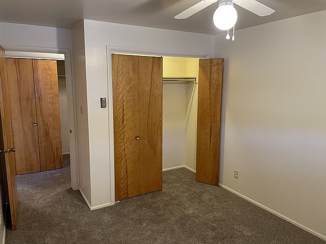 Bedroom has large lighted closet